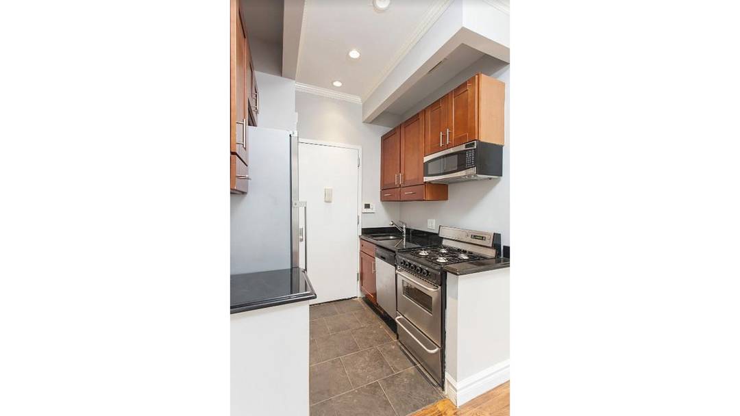 Welcome to Residence 2E at 459 West 50th Street a beautifully renovated 2 bedroom, 2 bathroom home in the heart of Hell's Kitchen.