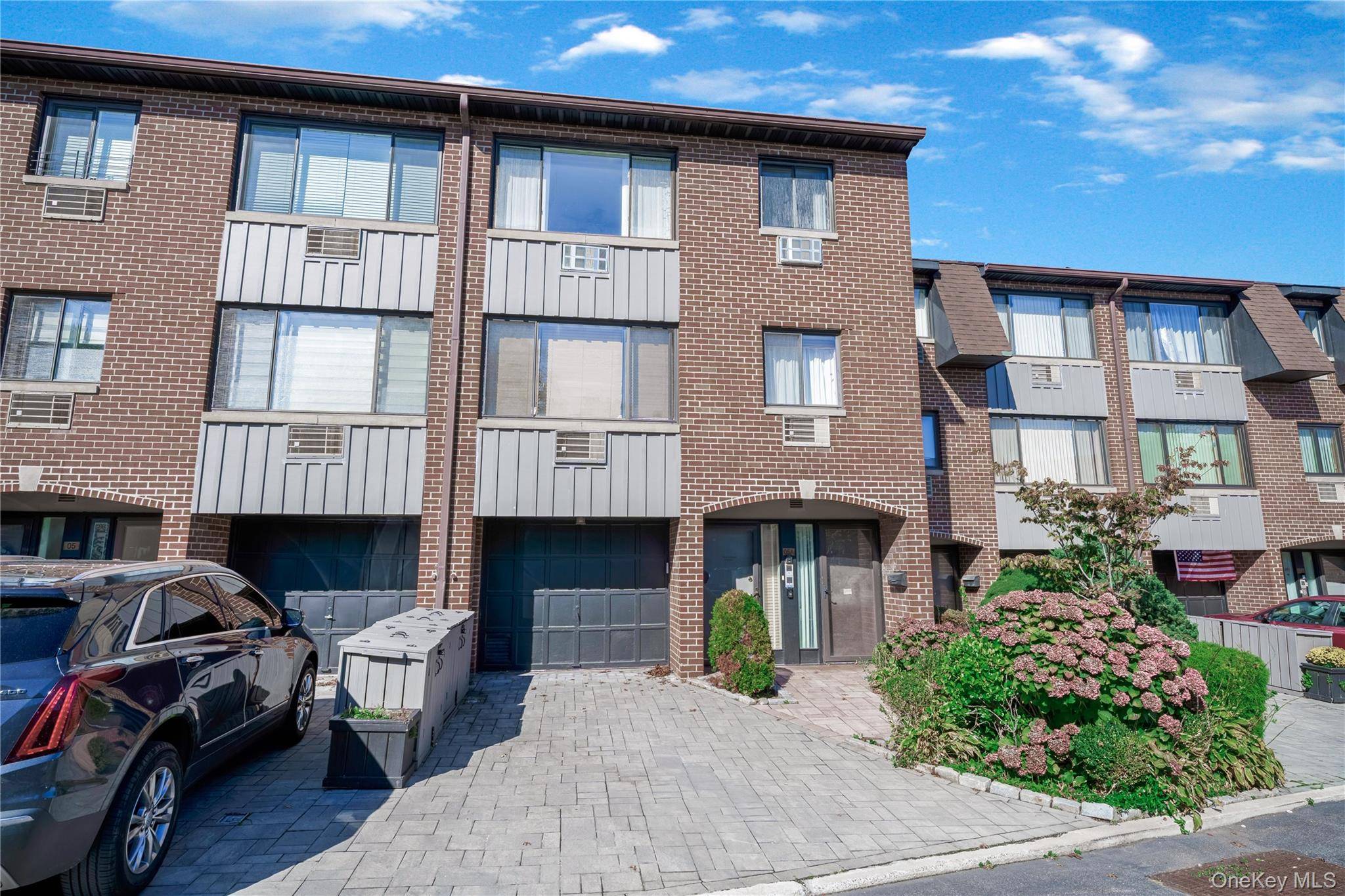 Welcome to Beechhurst Shore, an exclusive gated waterfront community nestled along Riverside Drive.