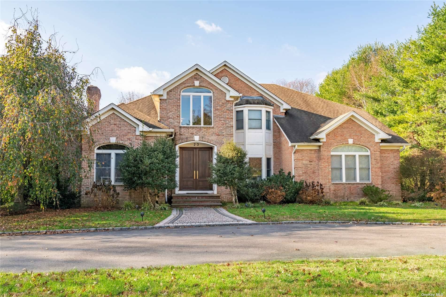 UPPER BROOKVILLE. On the banks of a scenic pond and off a quiet cul de sac awaits this completely renovated and recently redone timeless home.
