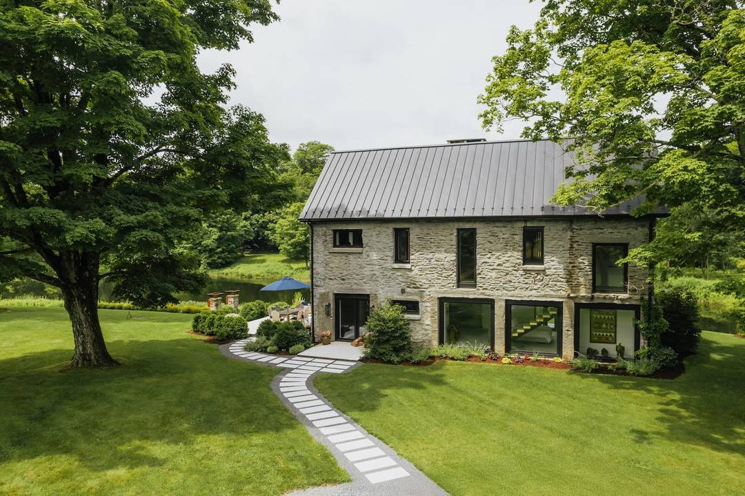 Welcome to a rare and remarkable retreat on 129 acres comprised of meadows, woods, and miles of groomed walking trails.
