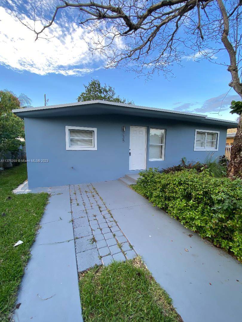 Fully renovated 2 bedrooms, 1 bathroom, with a private yard and a driveway.