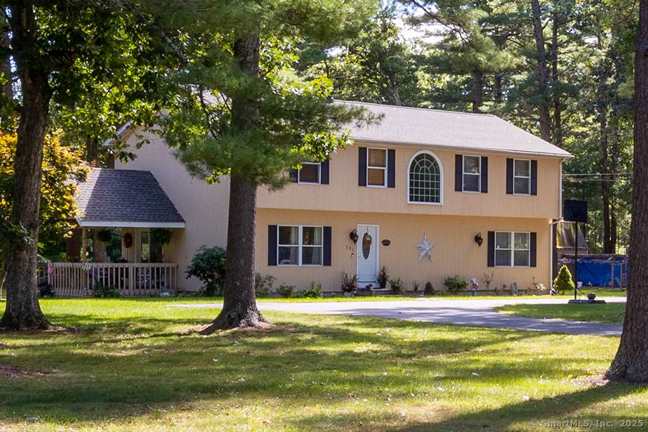 Welcome to this spacious Garrison Colonial nestled on just over 2 acres in Coventry with coveted water access to Johnson's Pond !