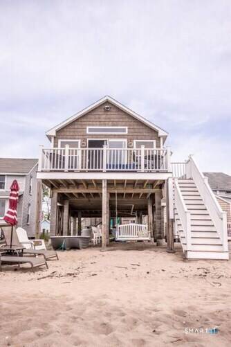 Three direct beachfront cottages located right on the sand of Long Island Sound in Clinton, Connecticut offer a rare turnkey coastal investment opportunity.