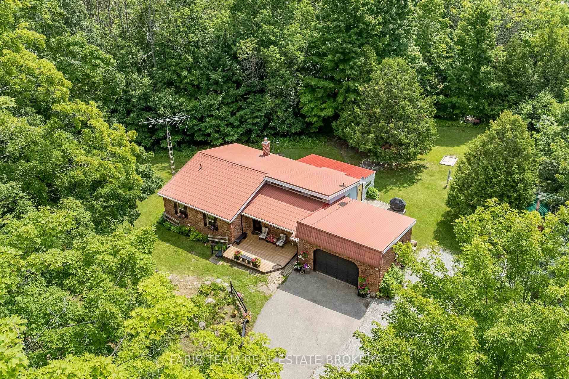 Top 5 Reasons You Will Love This Home 1 Nestled on an elevated and private 1 acre lot, this delightful ranch style bungalow delivers both tranquility and convenience, located just ...