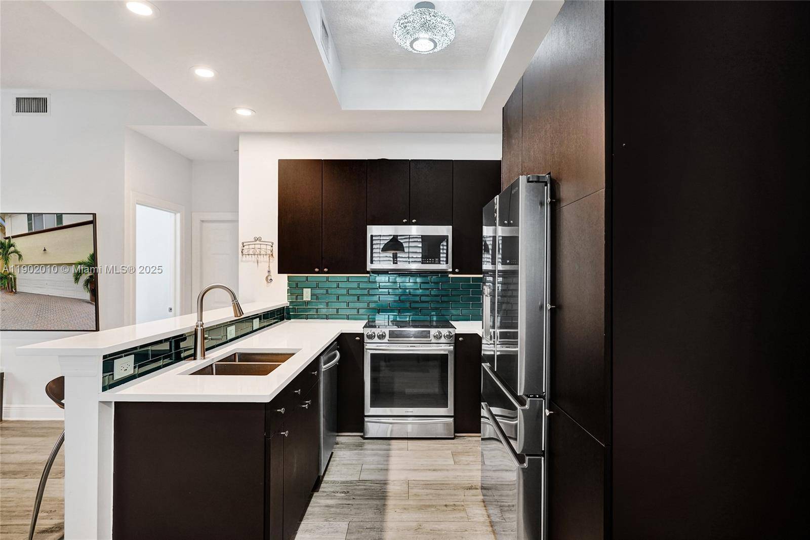 Experience luxurious townhouse living in the heart of Lake Worth Beach with this beautifully renovated three bedroom, two and a half bath home.
