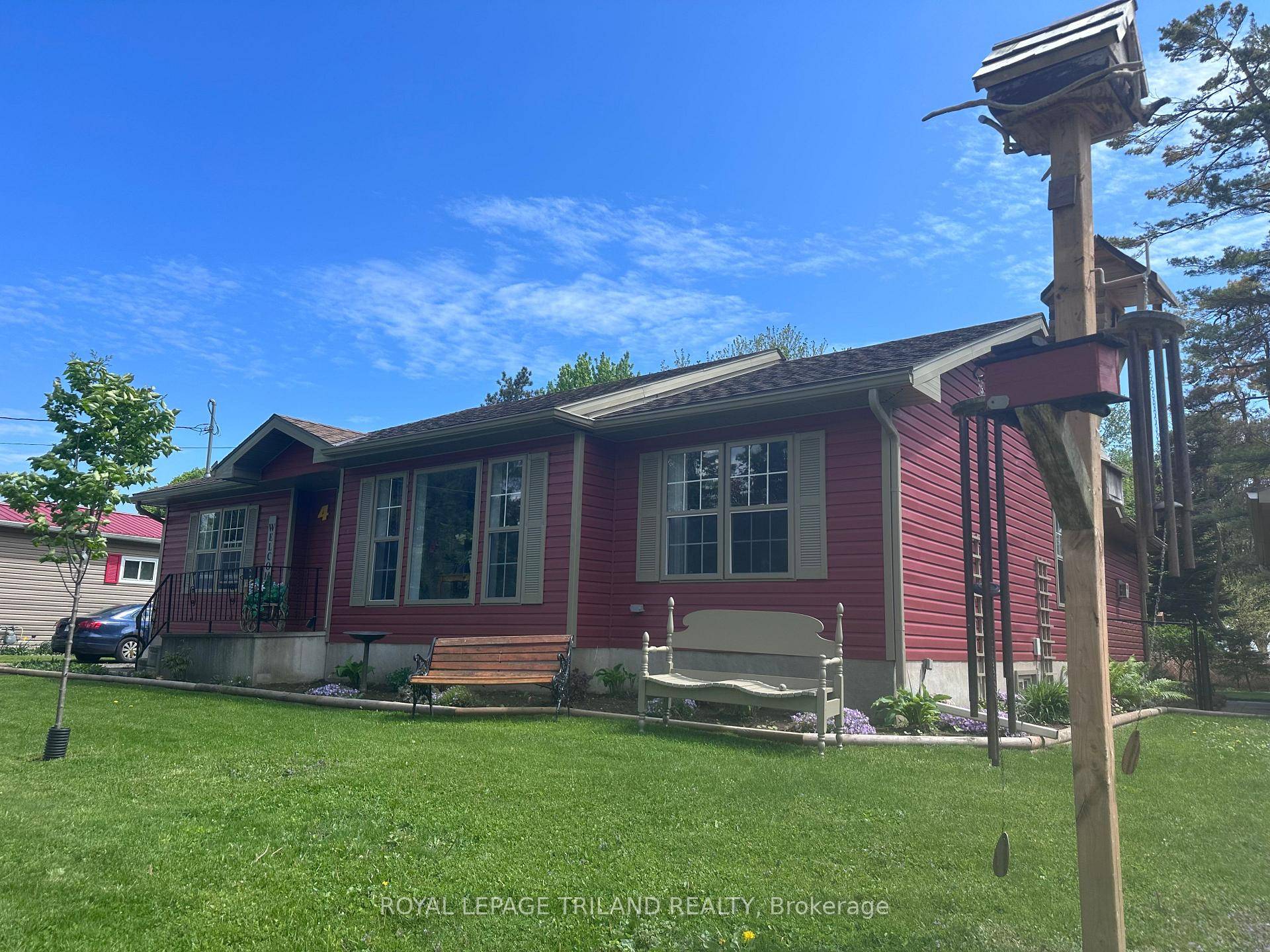Welcome to this beautifully maintained 4 season double width mobile home, perfectly situated on a spacious oversized lot.