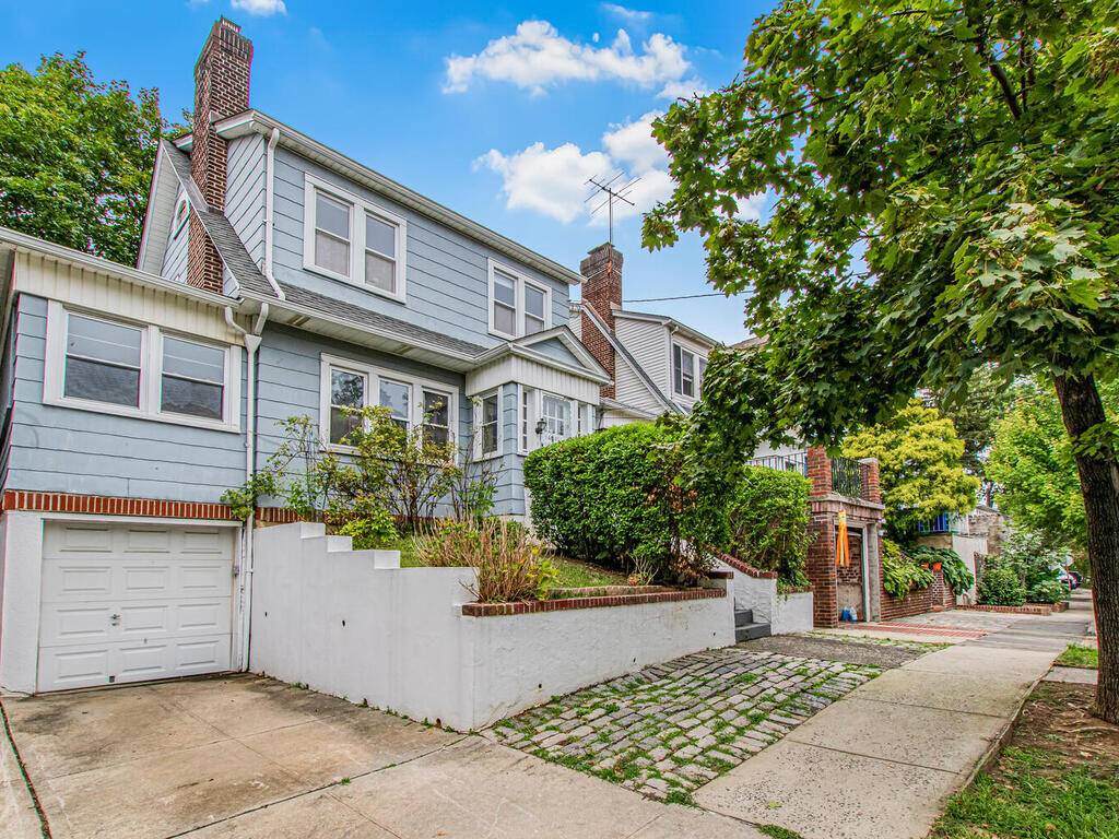 Charming 4 bedroom Dutch Colonial home with great outdoor space in North Riverdale on a quiet tree lined street First floor includes light filled open living room with wood burning ...