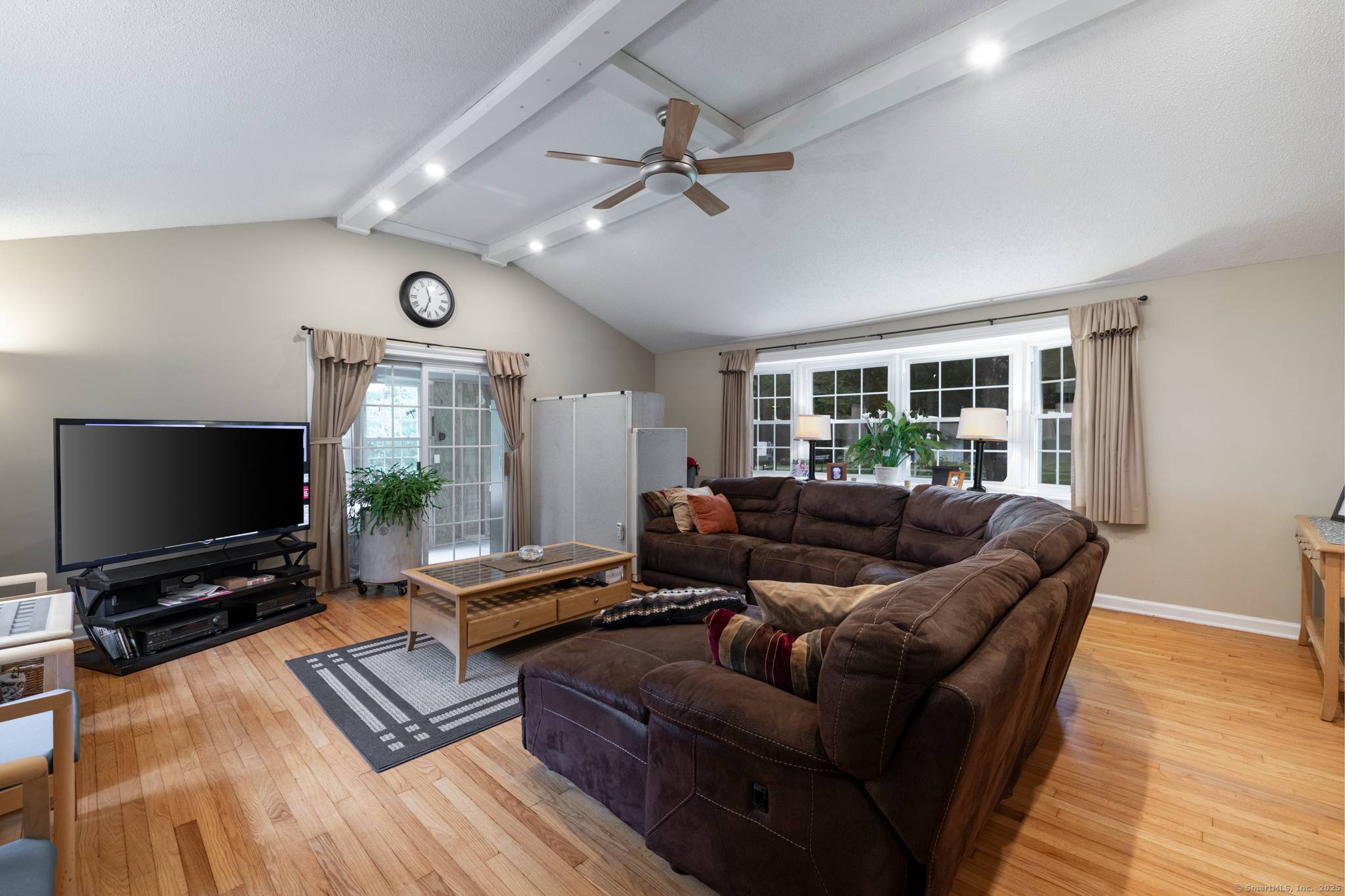 Discover this beautifully updated ranch style home ideally situated on over an acre of level, private land, backing onto a tranquil nature preserve in the heart of Woodbury.