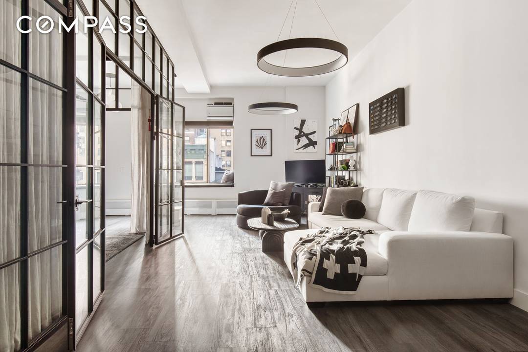 Mint condition loft with soaring 12ft ceilings and bright eastern sunlight.