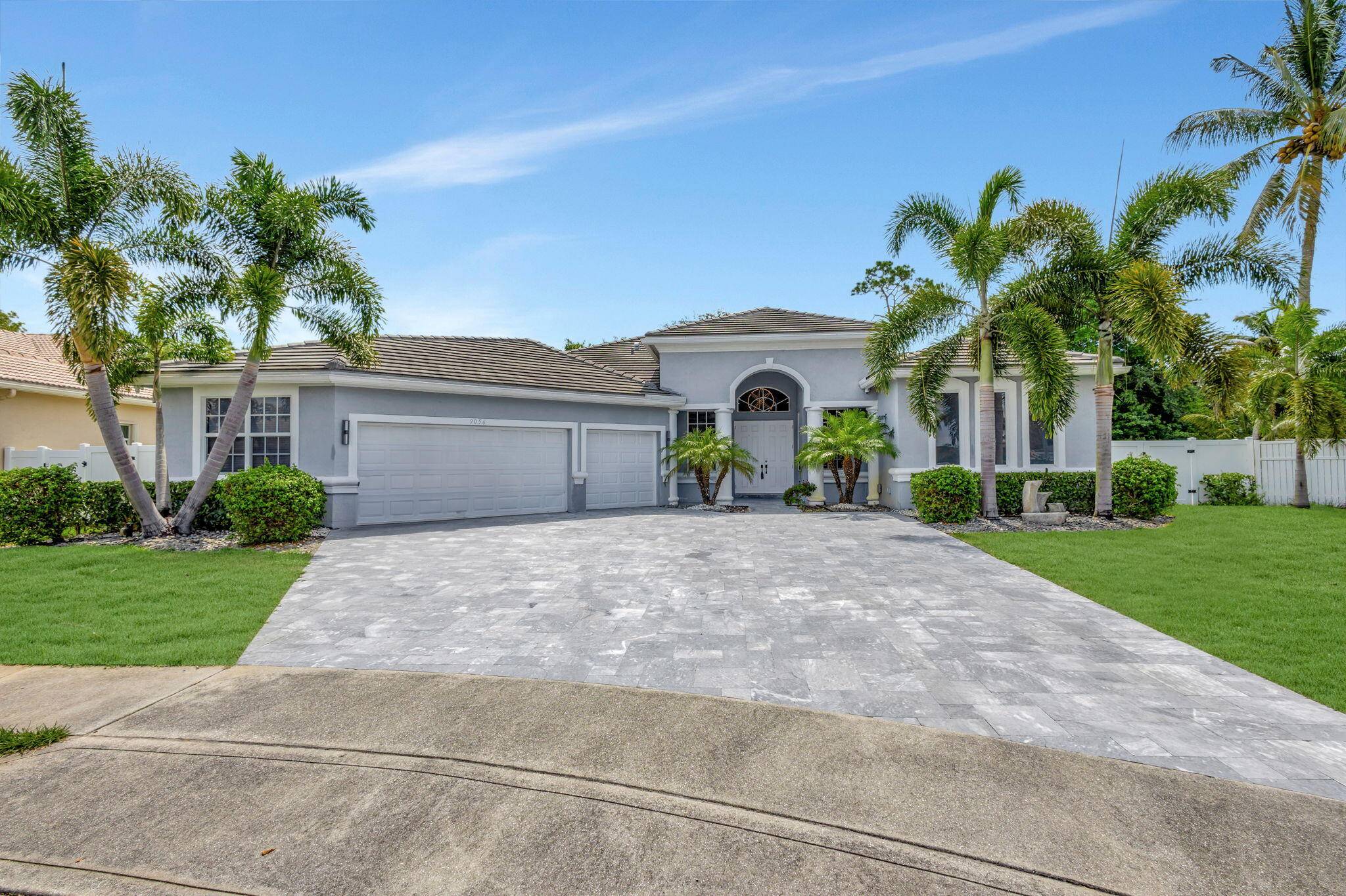 This amazing residence boasts comprehensive updates, including a 2020 modern flat tile roof, impact windows for safety and energy efficiency, and a whole home generator.