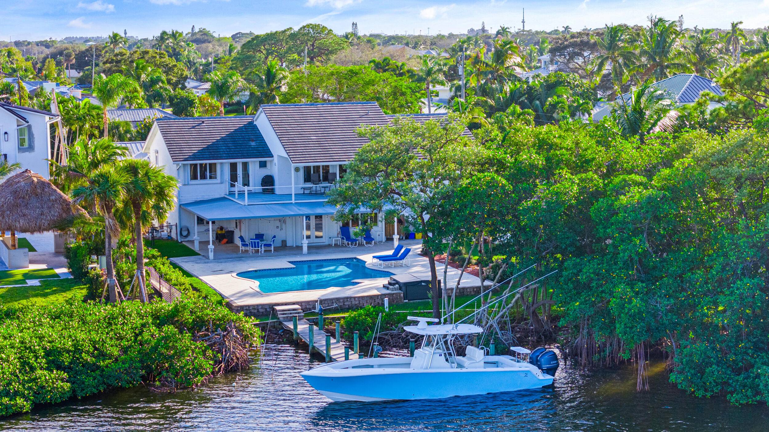 Serene, peaceful and seemingly endless views of Jupiter's bright blue waters are only part of what makes 965 Marlin Dr irreplaceable.