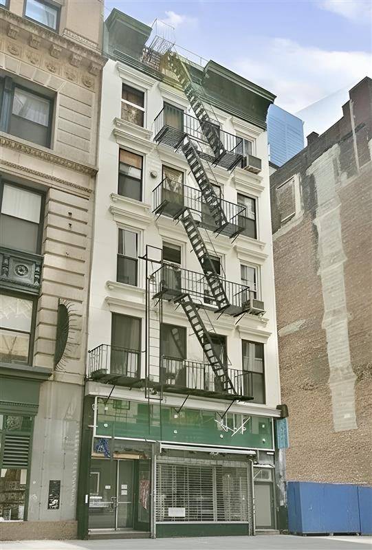 True Downtown live work loft in a five unit pre war building on historic Fulton Street.