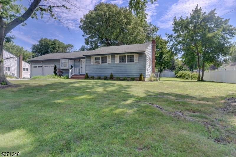 Spacious 3 Bedroom Ranch with expanded Family Room in a Prime Location !