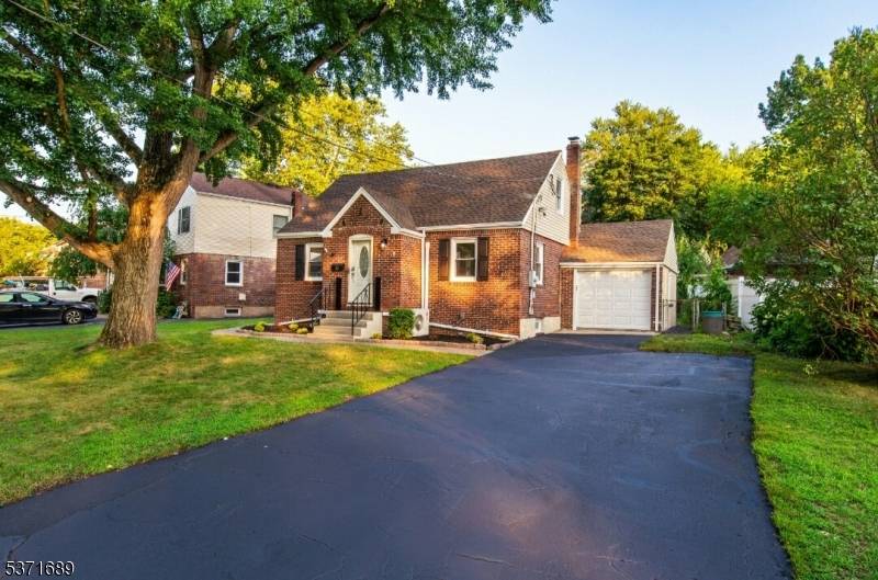 Captivating and meticulously renovated home nestled in a highly sought after neighborhood of a desirable town of Dumont.