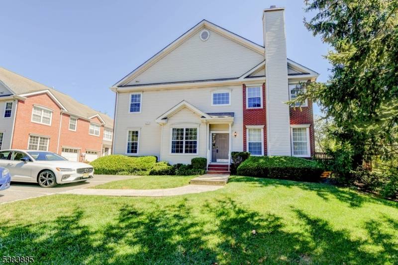 Nestled in the desirable Hunting Ridge community, this bright townhouse offers the perfect blend of suburban tranquility commuter convenience.