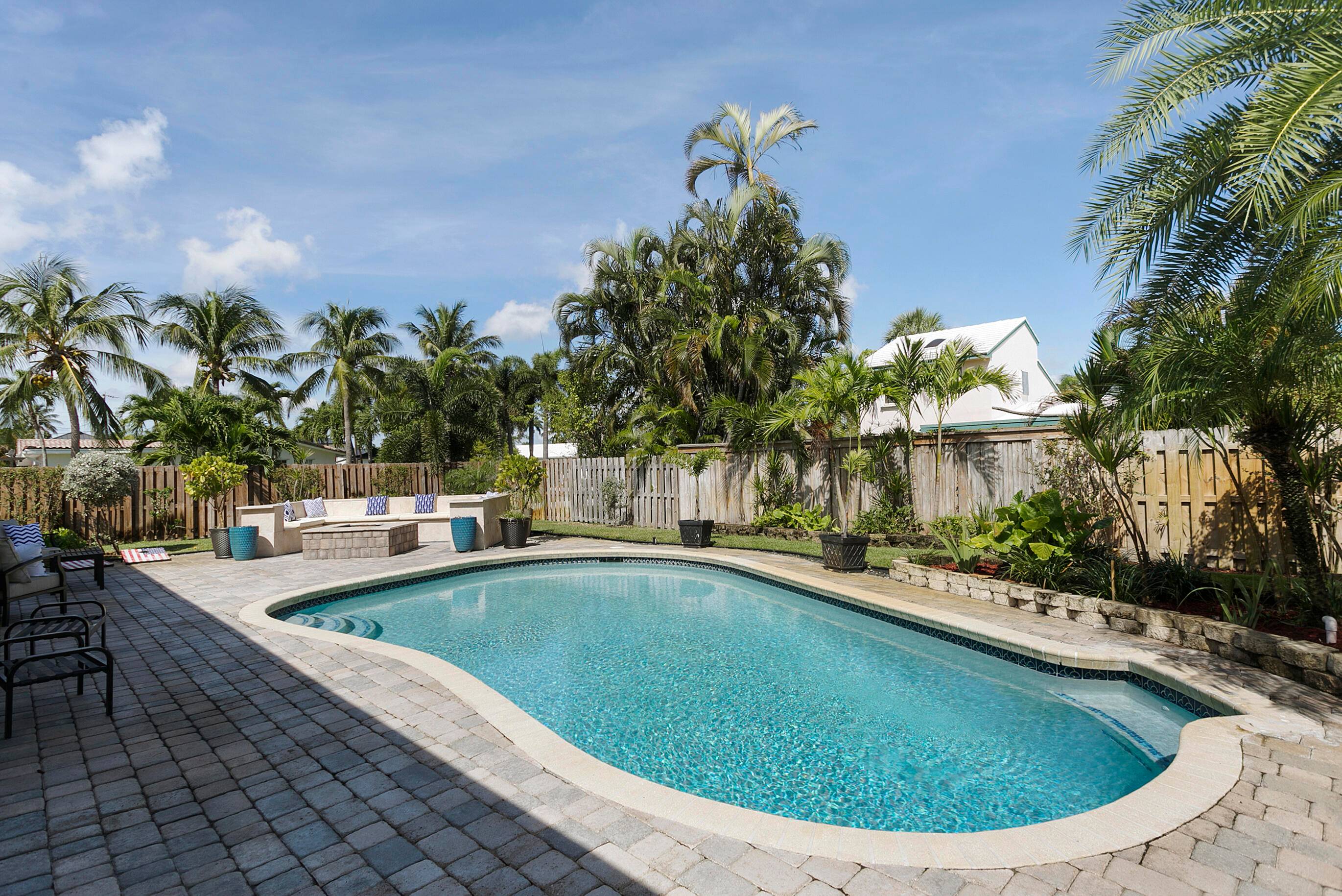 Beautiful Tropical backyard on a Private corner lot.