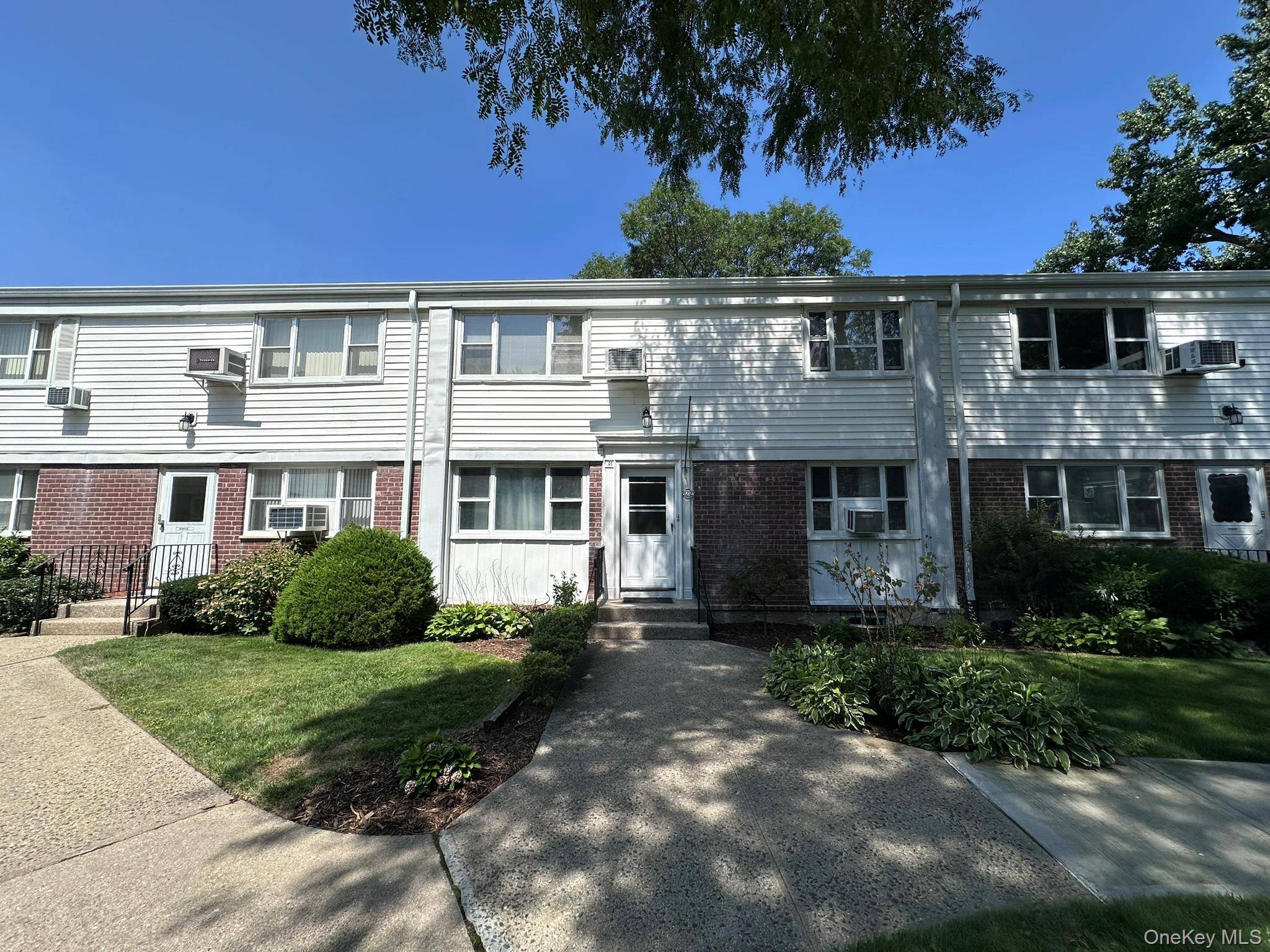Bay Terrace Gardens Renovated 2 Bedroom 1 Bath lower unit in Beautiful Tree lined courtyard.