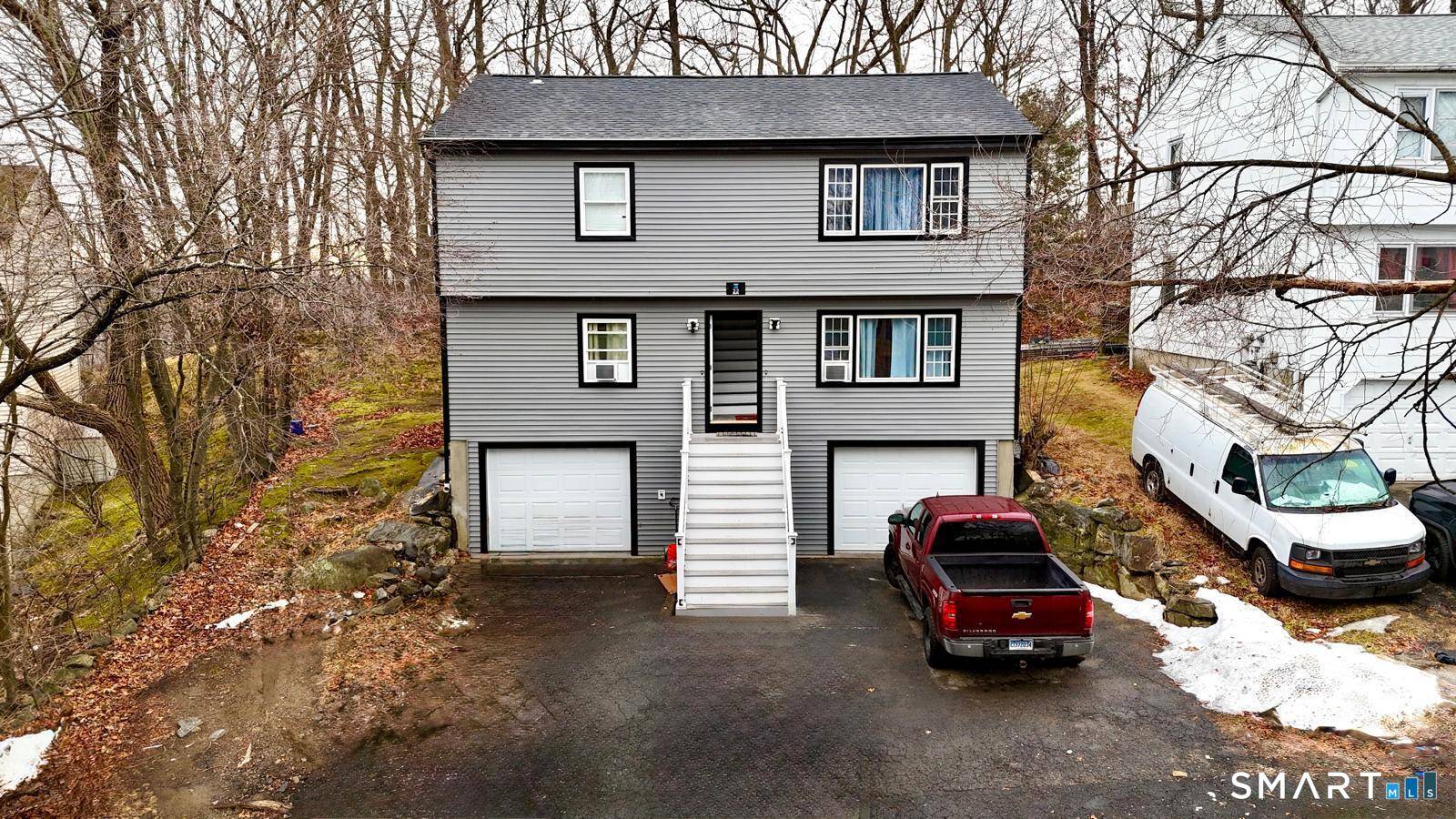 Welcome to 22 Irving Place, Danbury, CT, a well maintained two family home featuring two 3 bedroom apartments, offering flexibility, comfort, and long term value.