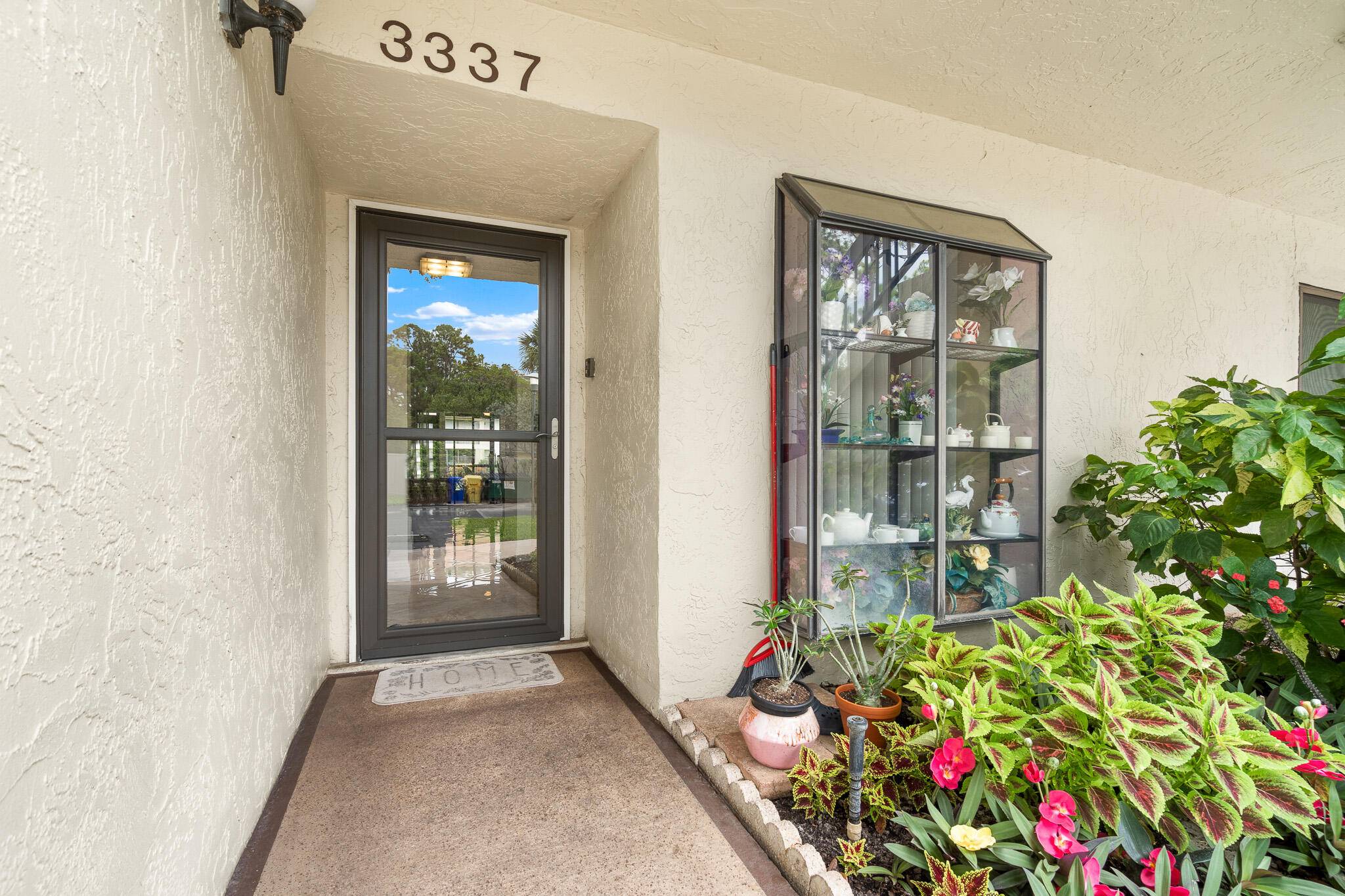 Stunning 1st floor condominium with water fountain view Both baths and kitchen have been renovated with new modern lighting, cabinets and granite countertops.