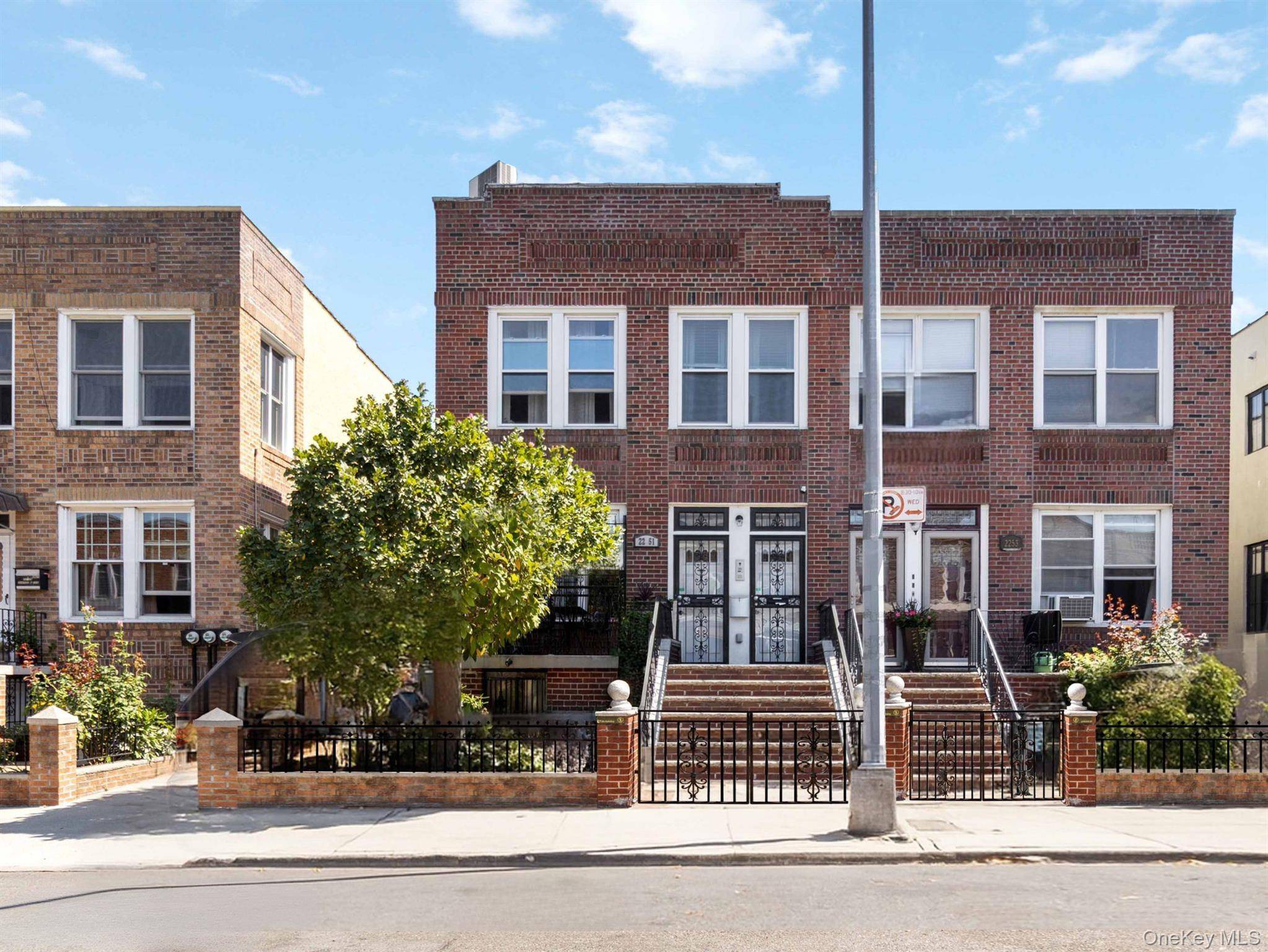 Rare, Semi Detached, Two Family Home with Private Parking and Backyard.