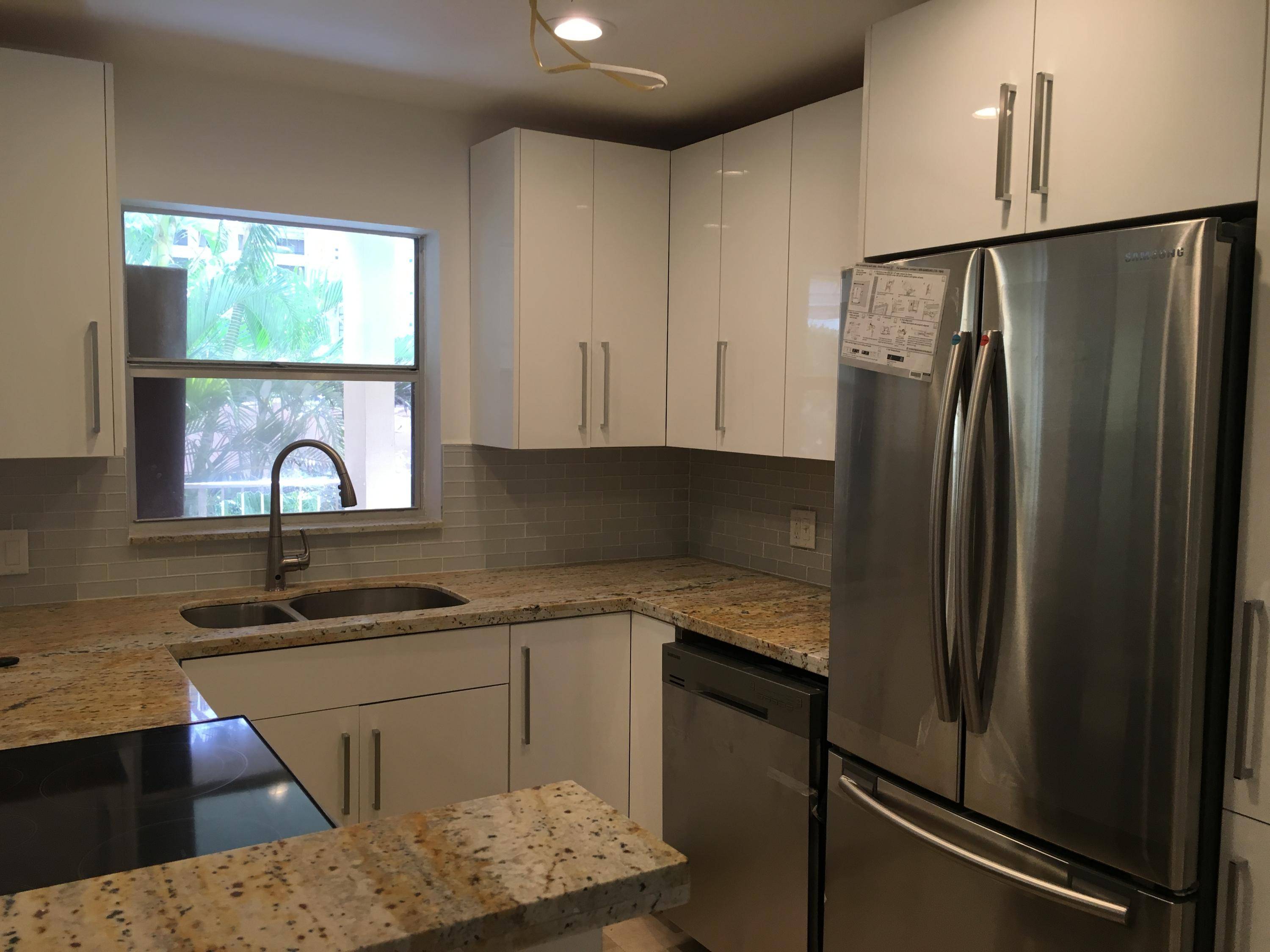 BEAUTIFUL 2 2 CONDO, REMODELED WITH STAINLESS STEEL APPLIANCES, ALL NEW IMPACT WINDOWS, GREAT WATER VIEWS FROM POOL AREA WITH A NICE CLUB HOUSE AND BARBECUE GRILLS.
