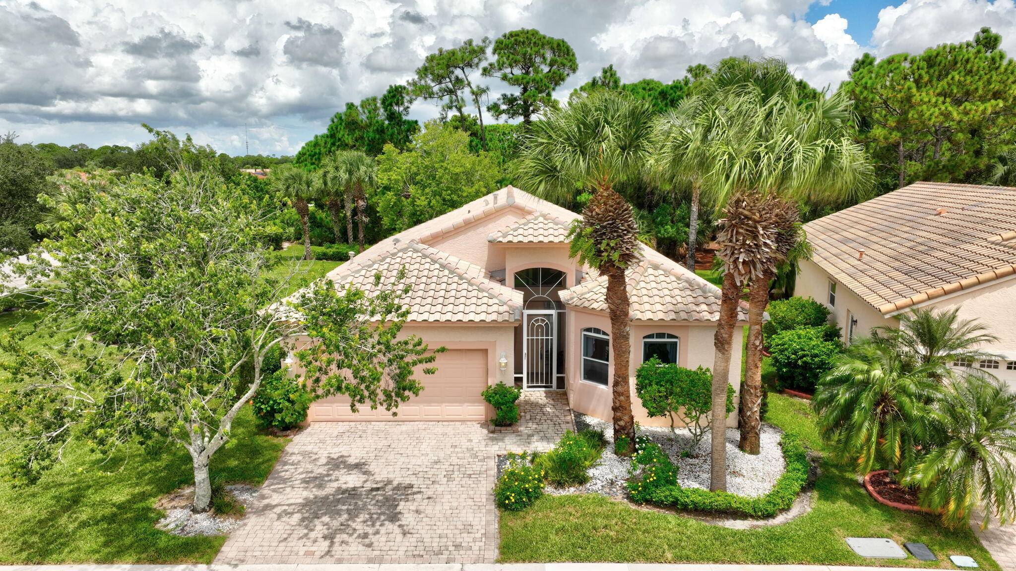 Rare private preserve and corner lot with no backyard neighbors, nestled in the sought after 55 lifestyle community of The Cascades at St.