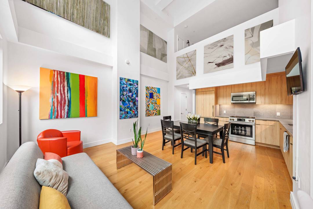 This brand new duplex condominium combines soaring scale with thoughtful design in the heart of Long Island City.