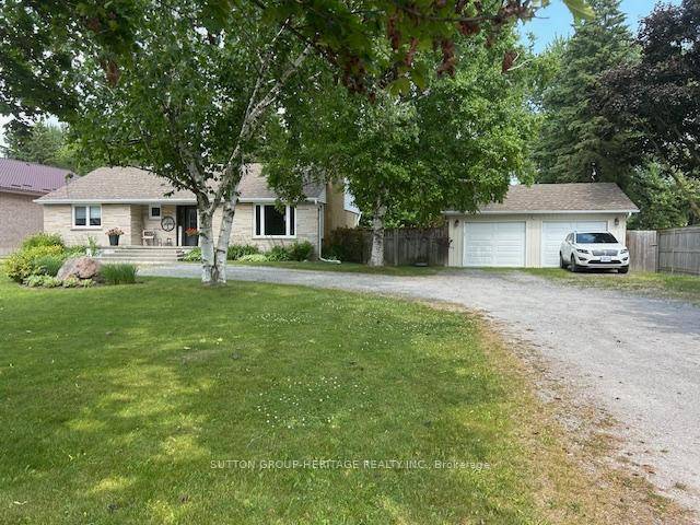 ONE OF A KIND ! ! ! Stunning Brick Bungalow on half an acre.