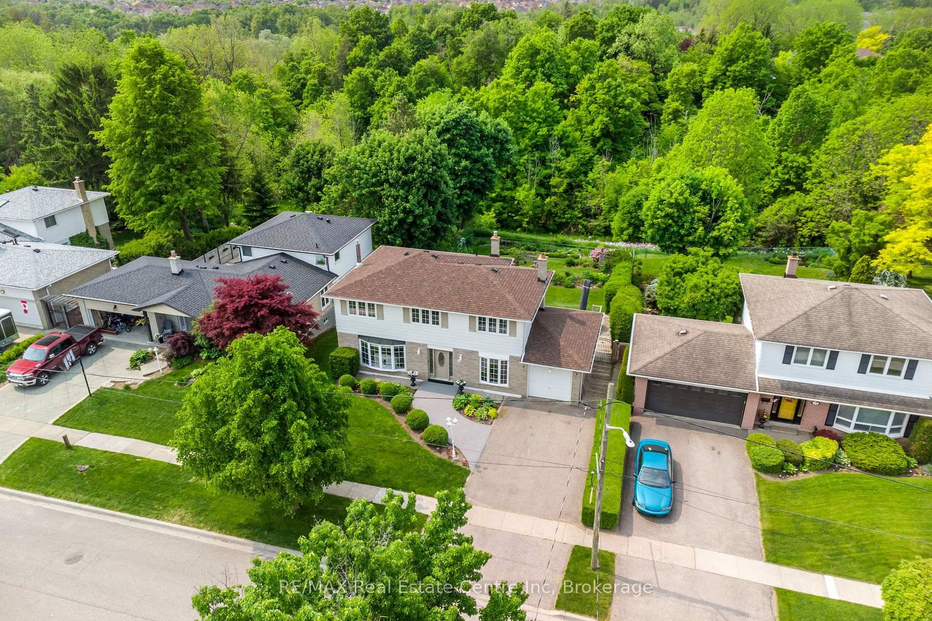 Welcome to 29 Stockman Crescent, Halton Hills where nature meets comfort in this beautifully maintained family home backing onto serene conservation land.