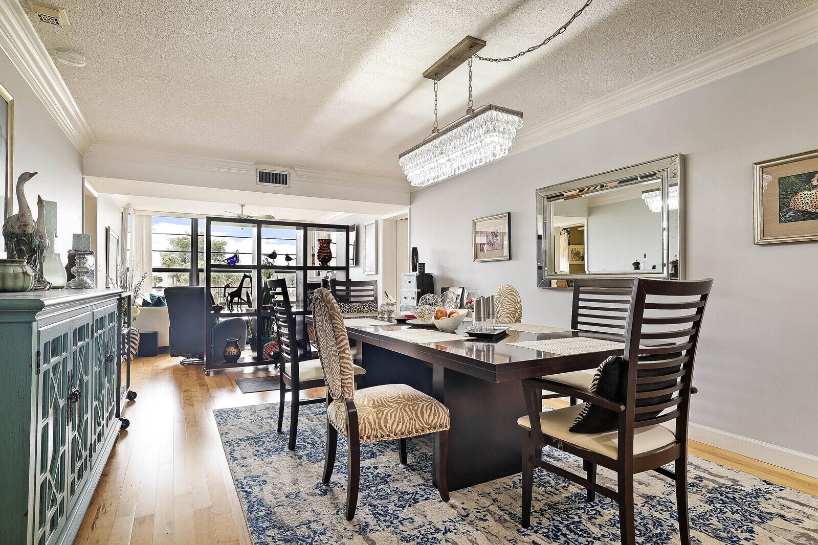 Homey and spacious corner unit condo with desirable floor plan that includes a full sized laundry room and storage bonus room.
