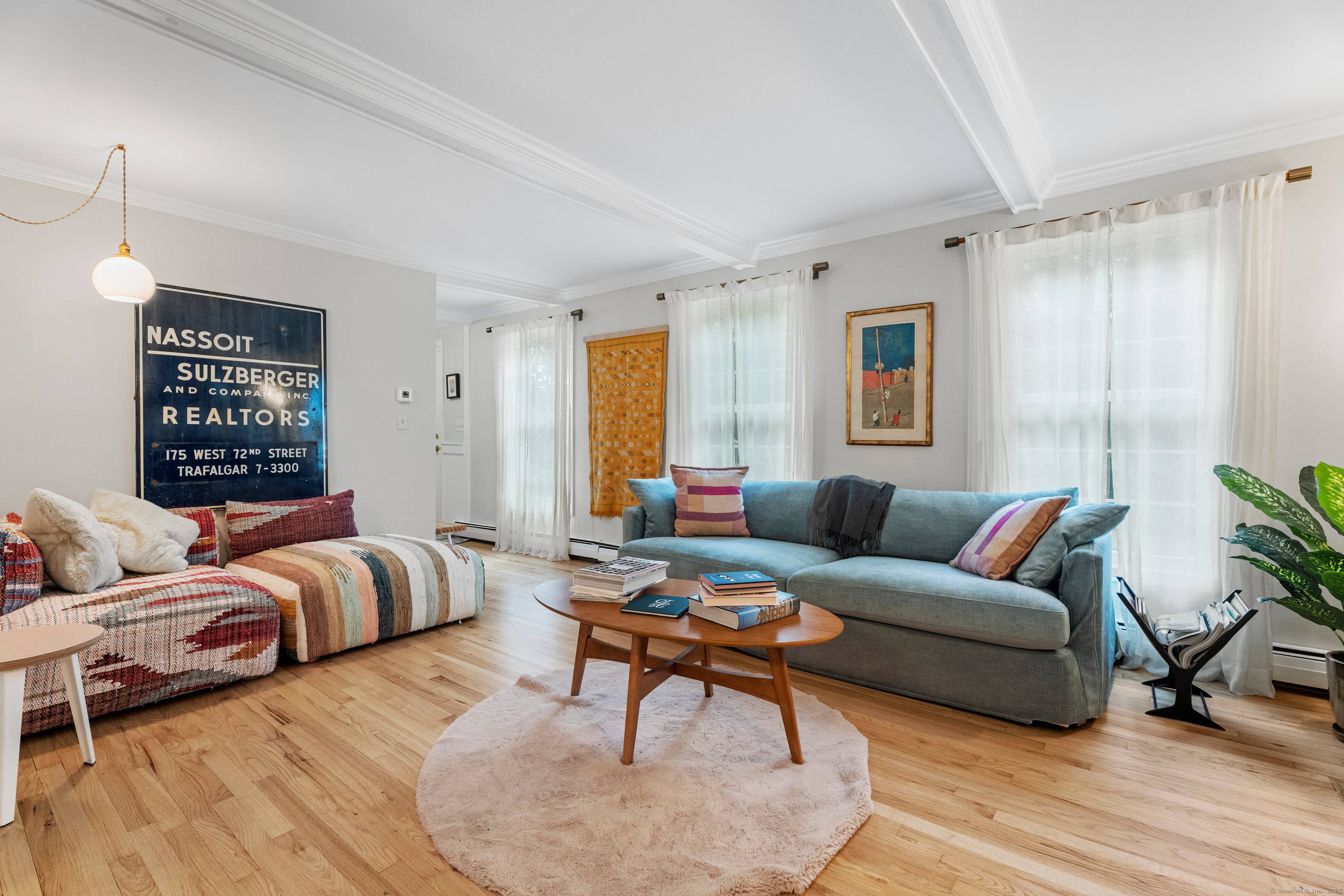 Quintessential New England Cape on over an acre, situated perfectly to enjoy the serene natural beauty of North Madison, while being only minutes from downtown or Madison beaches.