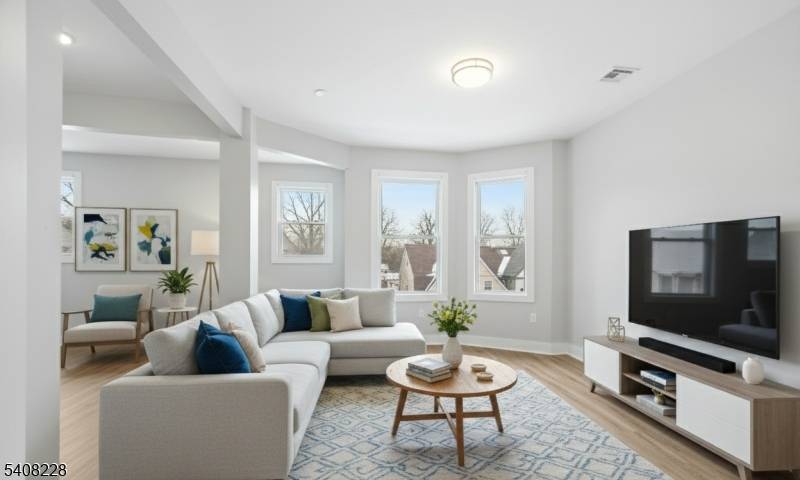 Rare opportunity to own a massive, turnkey 3 family property featuring identical, oversized floor plans on every level.