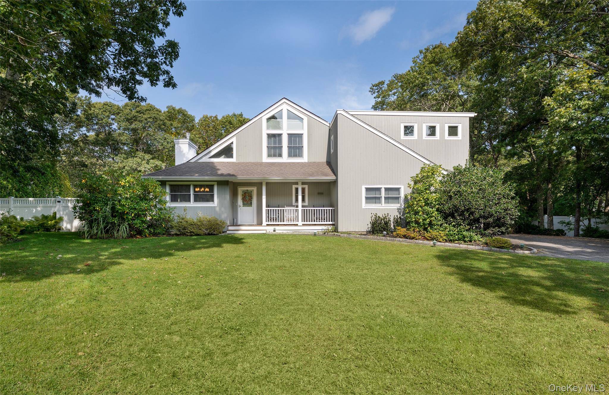Nestled within the private community of Squire Woods in Hampton Bays, this beautifully updated and meticulously maintained four bedroom, three and a half bath home offers the perfect blend of ...