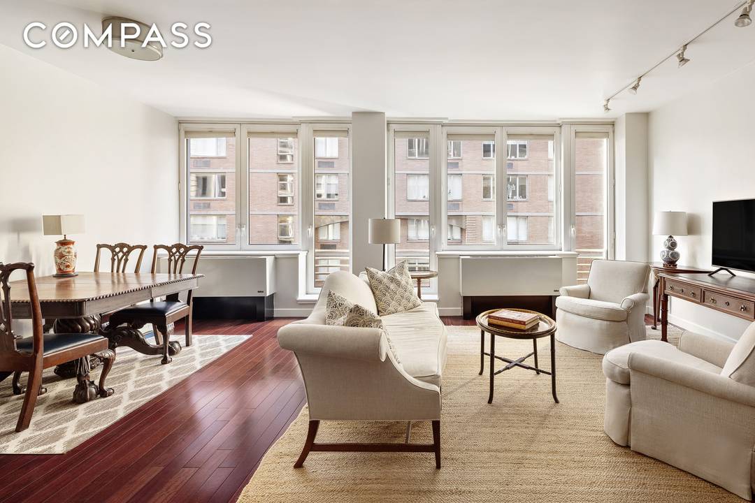 Residence 5B at The Indigo Condominium is an immaculate, oversized one bedroom with two full baths and 32 feet of south facing frontage overlooking the treetops of West 21st Street.