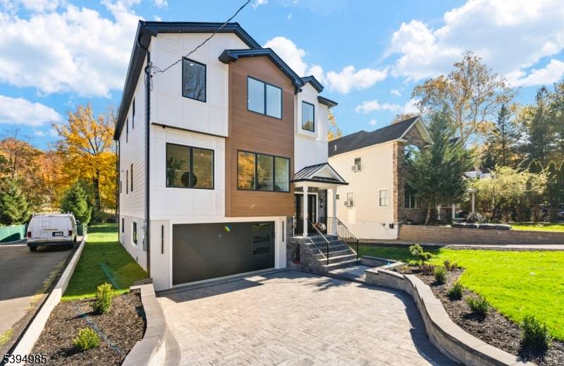 Welcome to this thoughtfully designed new construction featuring a finished ground level ideal for entertaining, plus a serene second floor retreat.