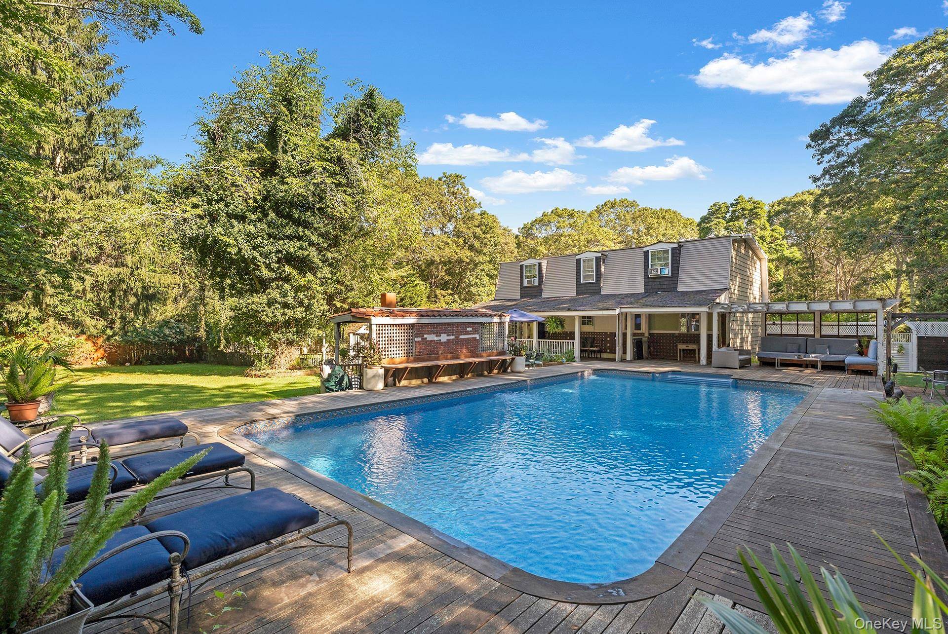 A versatile Colonial with pool, office amp ; finished basement.