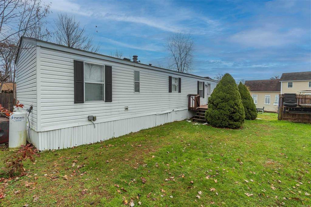 Step inside to this turn key mobile home, nestled in desirable park in Lake Katrine.