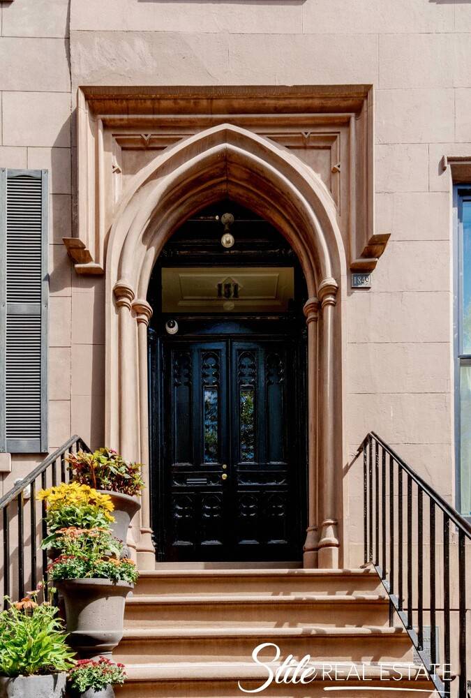 Built circa 1849 and bordering Tompkins Square Park to the East, The Charlie Parker Residence is a rare example of a Gothic Revival style townhouse.