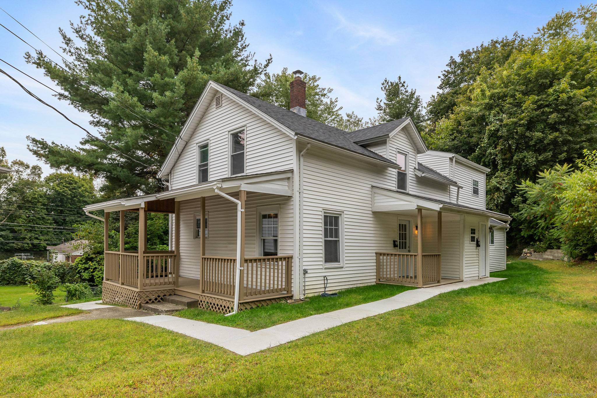 Welcome to 30 Christine Street, a beautifully renovated two family home tucked away on a quiet dead end street in Torrington.
