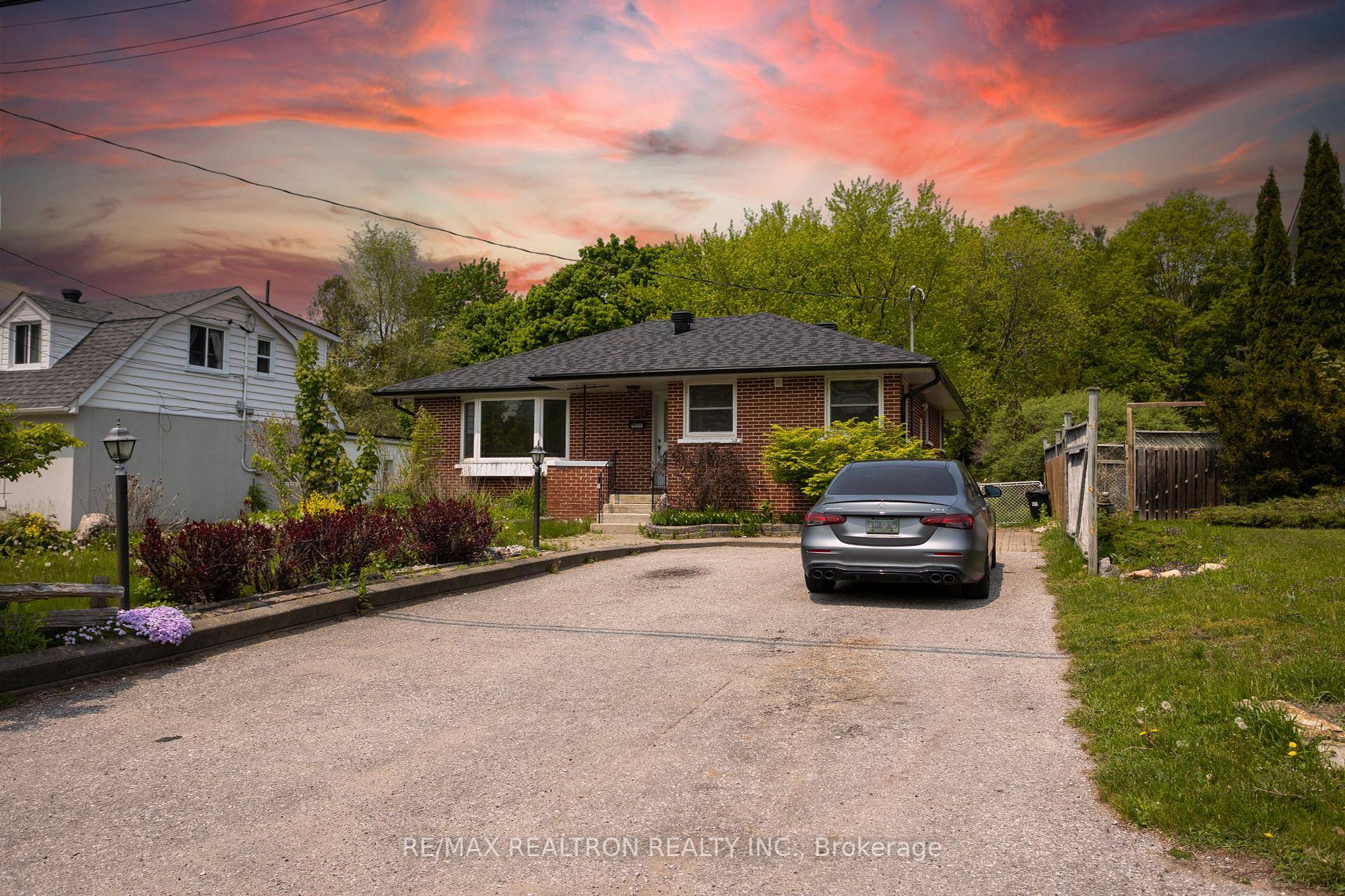Beautifully renovated 3 bedroom bungalow with private entrance, located on a premium 50x250 ft lot just minutes from the water !