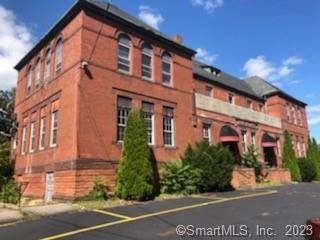 Two story 9, 272 square foot masonry and brick building that was at one time a school, and most recently a restaurant.
