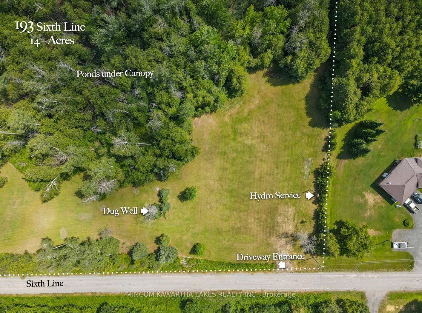 Lovely 14 acre property with a mix of bush, some hardwood, trails throughout property, pond.