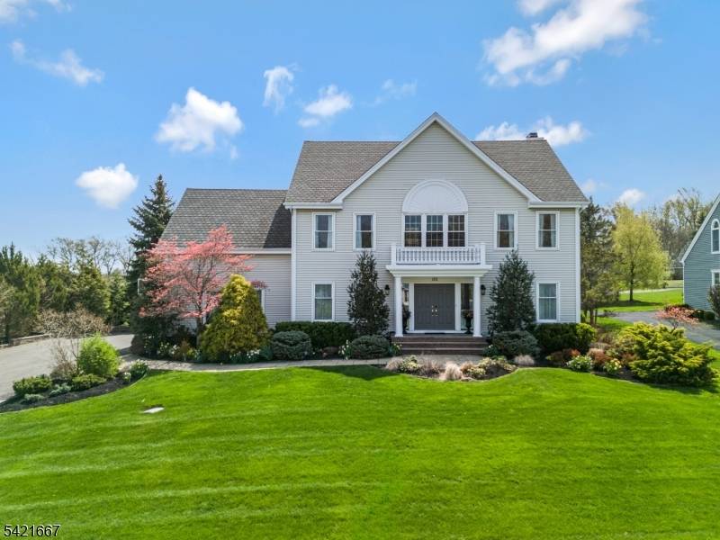 Set high on a picturesque street in one of Stony Hill's most sought after neighborhoods, this stunning home offers elegance, space, and thoughtful design throughout.