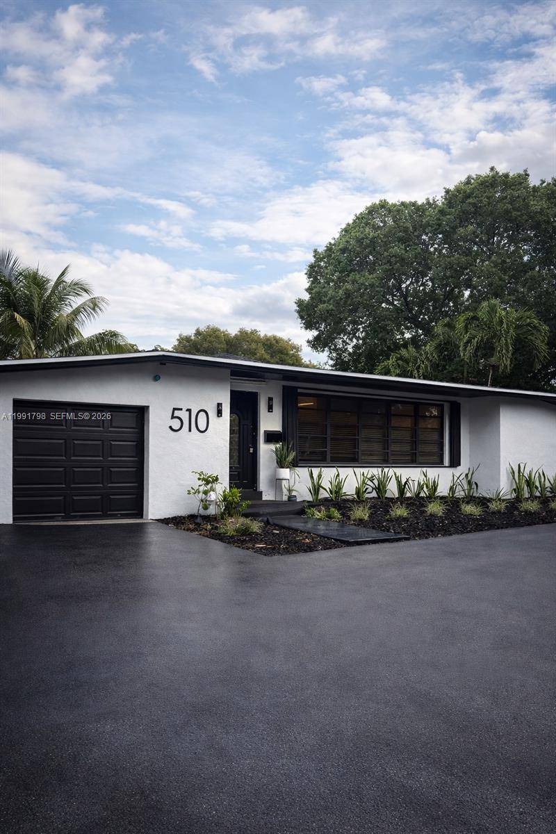 Welcome to your brand new home at 510 East Acre Drive in Plantation a beautifully updated 3 bedroom with an additional den that could be a bedroom, 2 bath, featuring ...