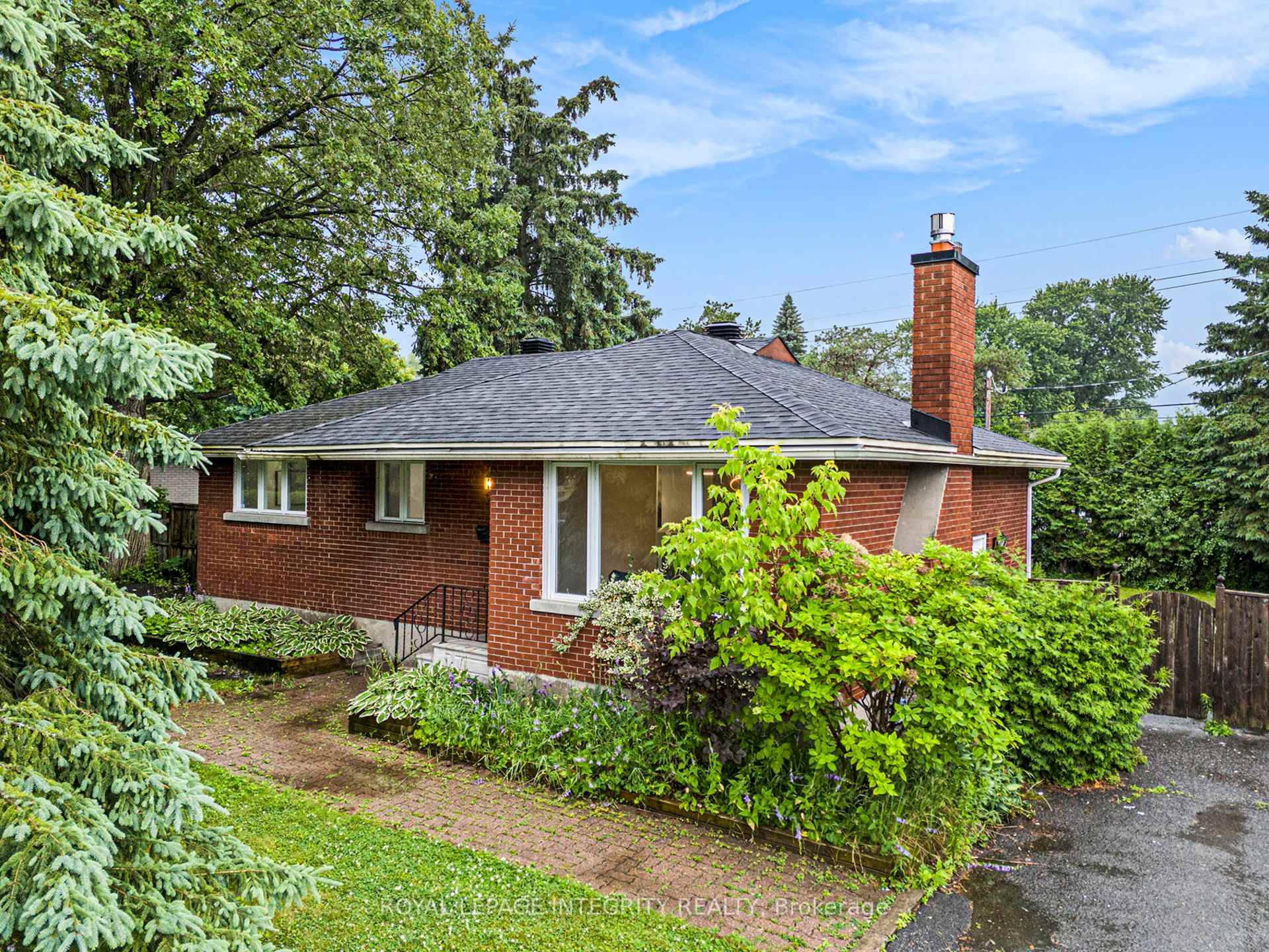 2025 totally renovated beautiful all brick bungalow 3 2 bedrooms on oversized wonderfully landscaped 75 100 private lot.