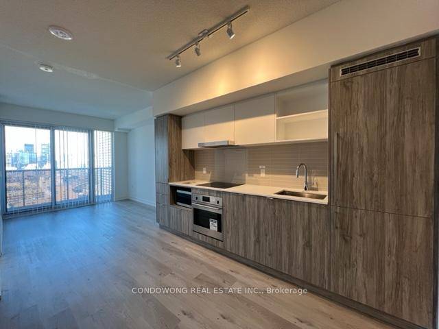 This 1 Bedroom Den Available At Menkes Sugar Wharf Condos !