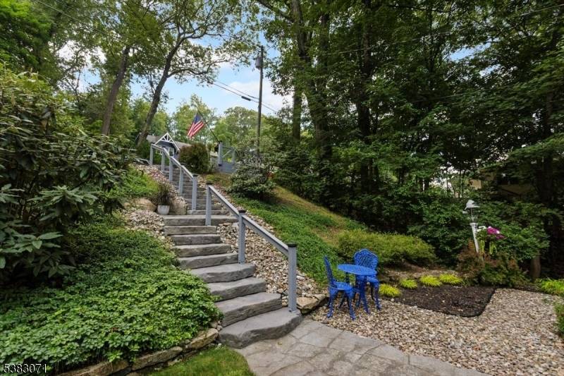 Welcome to this Beautifully maintained three bedroom Bi Level home, perfectly situated on a private double lot in the desirable Shore Hills section of Landing.