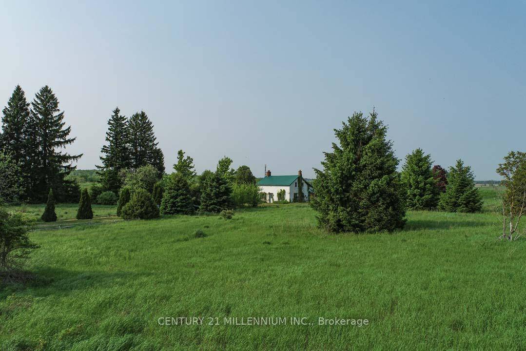 A fabulous opportunity ! Located on a 380 ft x 330 ft lot on a rural country paved road is this 2 storey 1800s farmhouse set on 2.