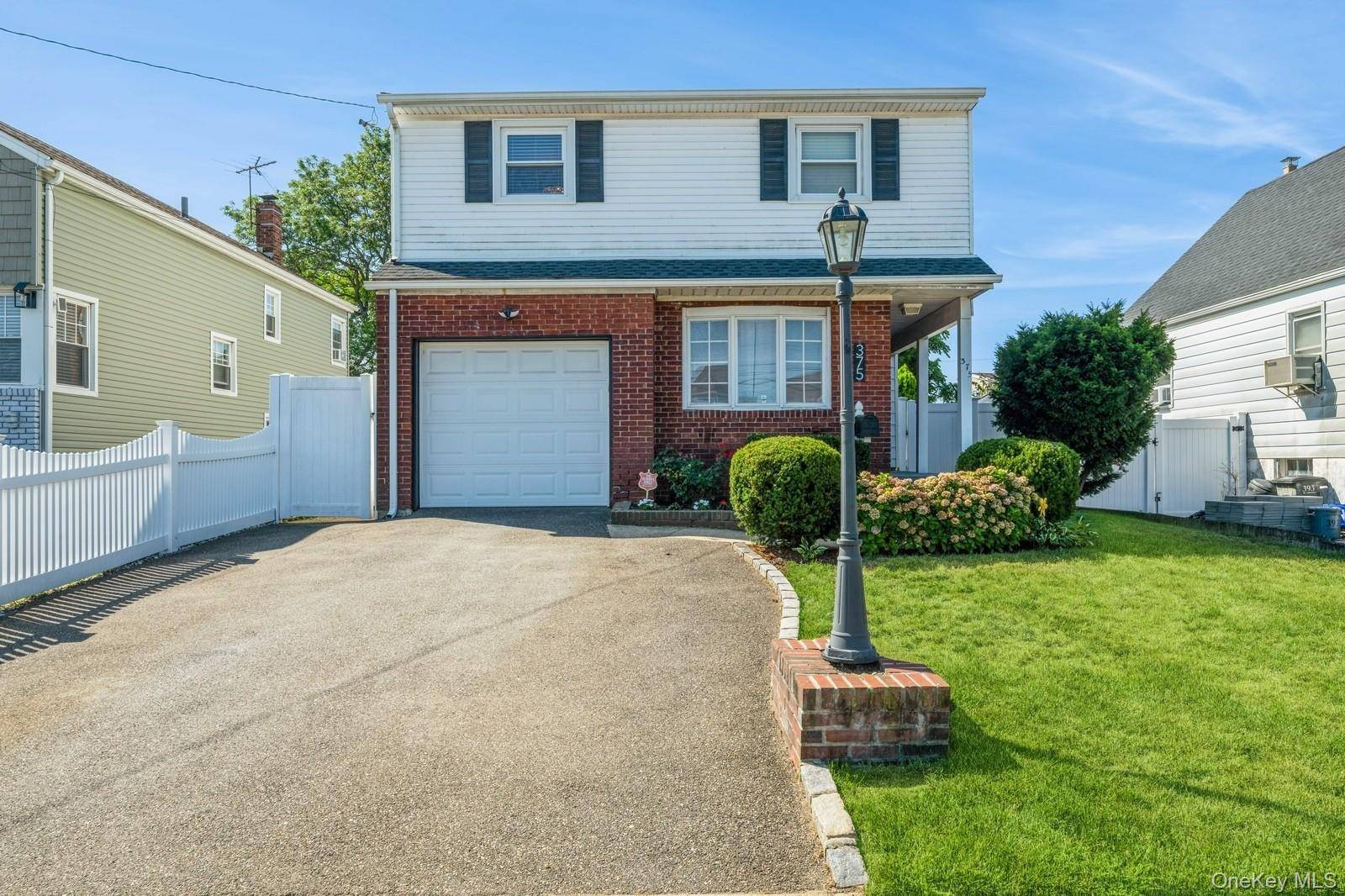 Welcome to this Oceanside, Split Level, Gem !