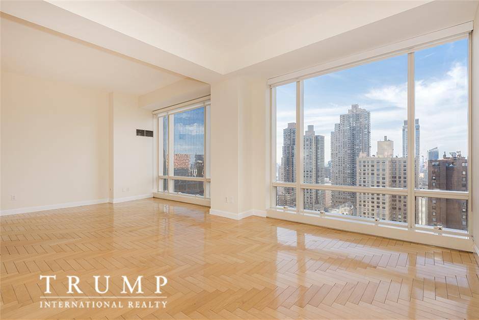 Rare opportunity to own a large one bedroom layout flexible two bedroom with L shaped Living Room Den at One Central Park West.